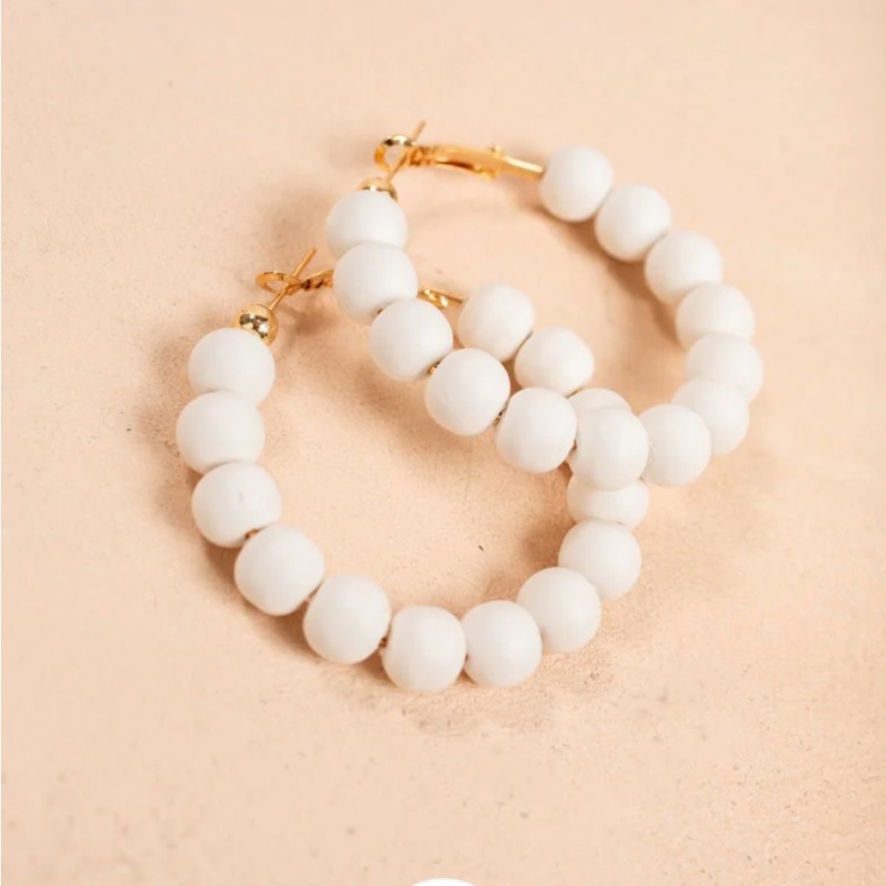 WHITE HOOP EARRINGS
